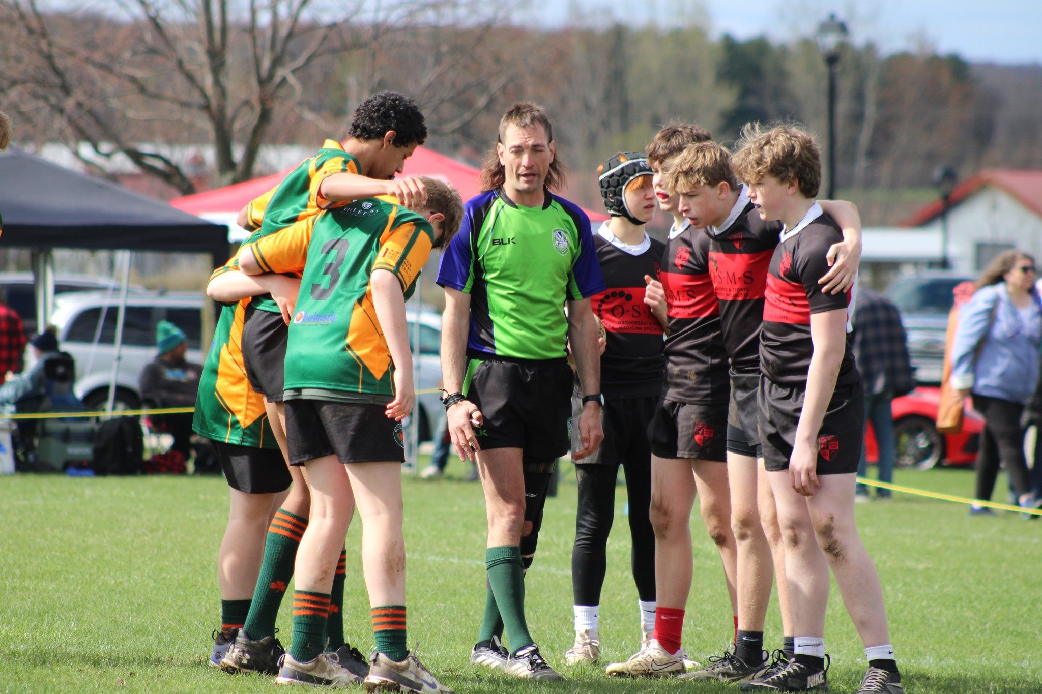 Rugby team huddle NE Wisconsin